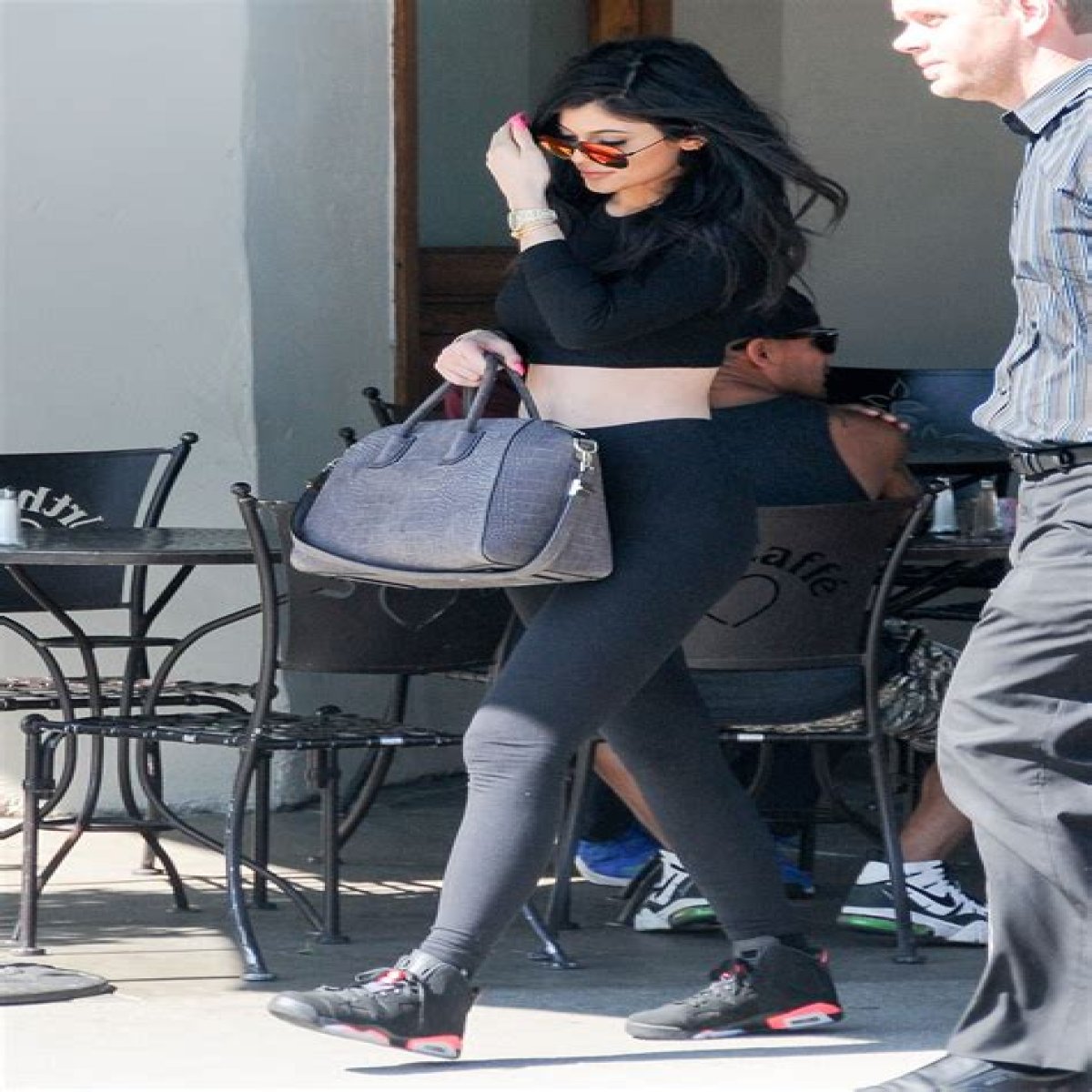 Kylie Jenner suffers embarrassing NSFW wardrobe malfunction in skintight black leggings as she promotes cosmetics line